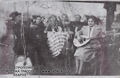 Ο Μπάτης, δύο φίλοι, ο Μπαγιαντέρας, άλλος ένας φίλος, ο Στράτος με την γυναίκα του, ενώ γλεντούν στην Πειραϊκή, την Καθαροδευτέρα του 1939